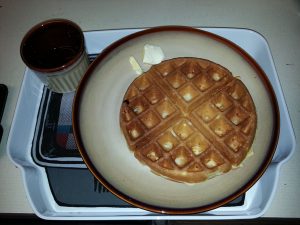 chicken-in-waffle-with-maple-syrup